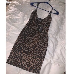 Skin tight body on leopard dress